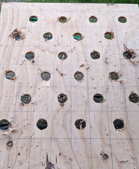 Grid of drilled holes