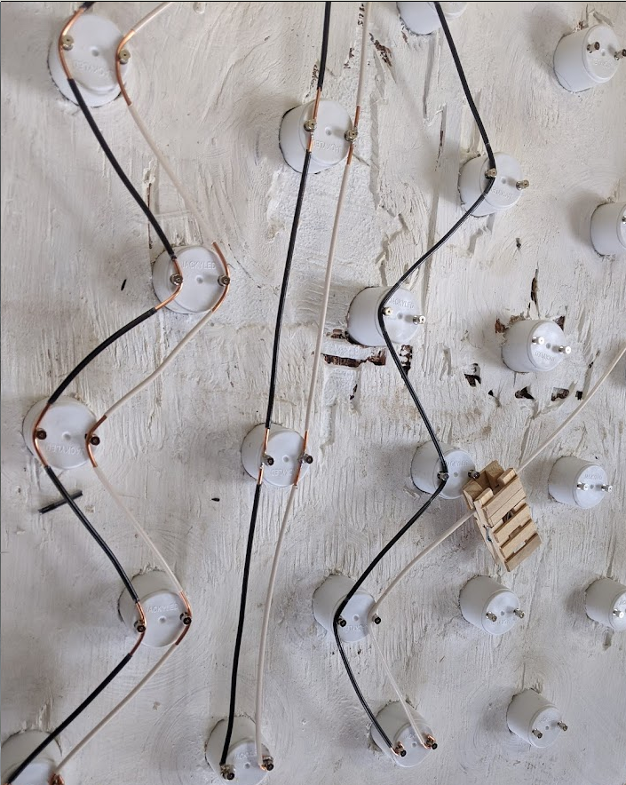 Wire stripper tool from clothespins and razor blades